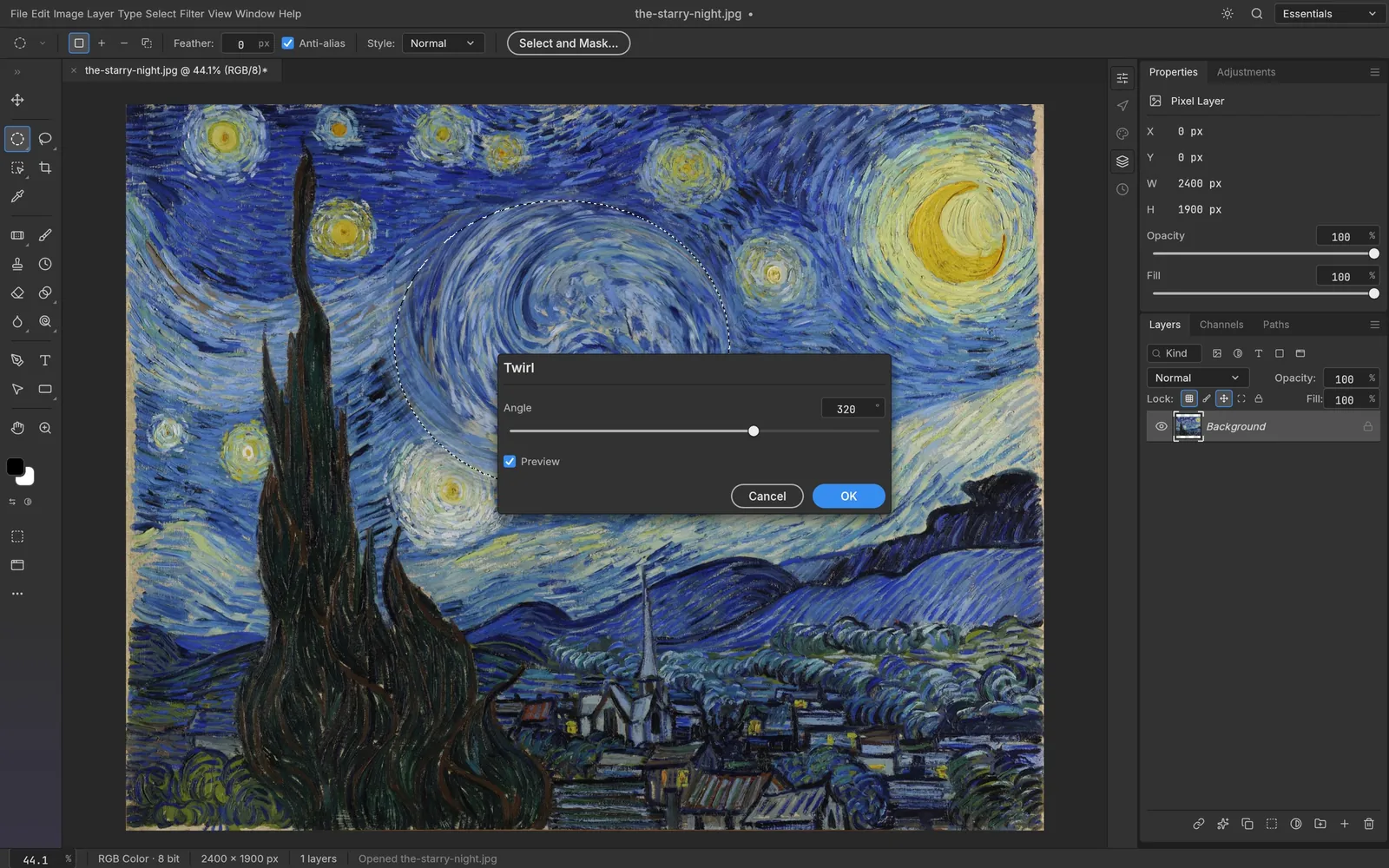 The Twirl filter previewing inside an elliptical selection on Van Gogh's The Starry Night